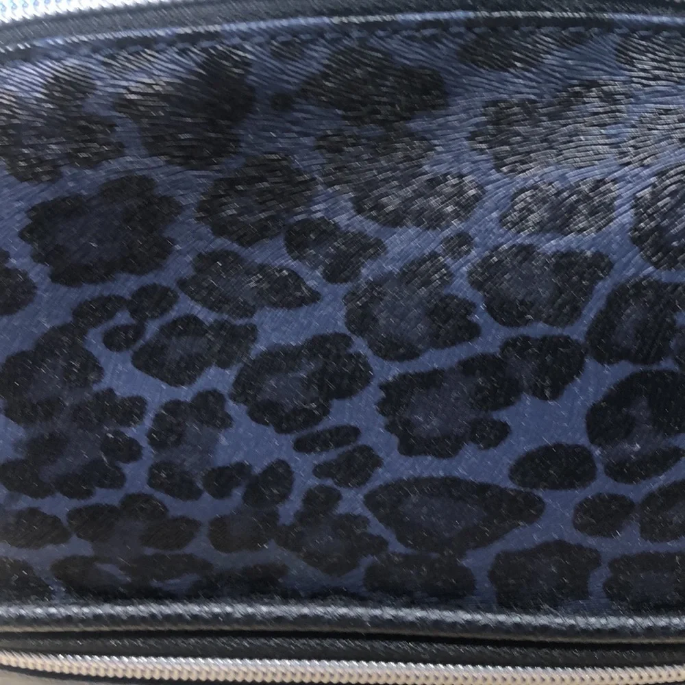 NWT cosmetic case in fantastic leopard print